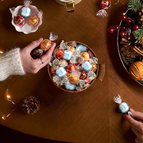 Image of Lindt LINDOR Holiday Assorted Chocolate Candy Truffles with Smooth, Melting Truffle Center, 15.2 oz. Bag