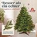 Premium Weihnachtsbaum künstlich 120cm - TESTSIEGER 10 Jahre GARANTIE - Naturgetreu, dichte Zweige, Künstlicher Weihnachtsbaum mit Holzständer – Tannenbaum künstlich von Pure Living