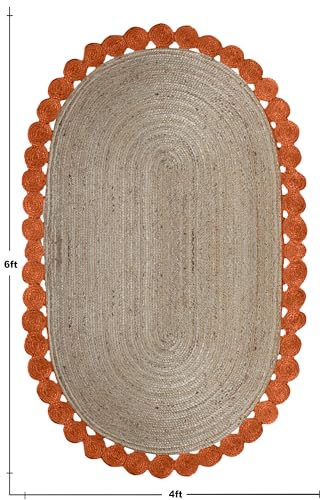 Tapis ovale en jute orange pour l'ambiance chaleureuse d'une maison de lac