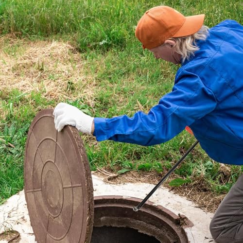 Travaux de maintenance et levage sans effort de regard d'égout en T - 7