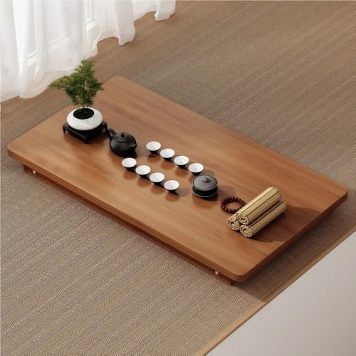 Table basse pliante japonaise compacte pour optimiser les petits salons