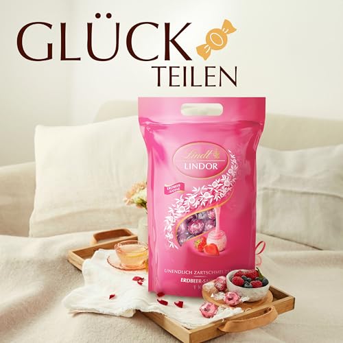 Lindt LINDOR Schokoladen| 1 kg Beutel, wiederverschließbar | ca. 80 Kugeln weiße Schokolade mit Erdbeer-Sahnecrème | Großpackung, Pralinen-Geschenk