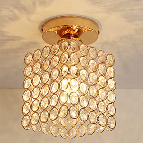 Lustre cage dorée en cristal pour sublimer l'ambiance de votre cuisine