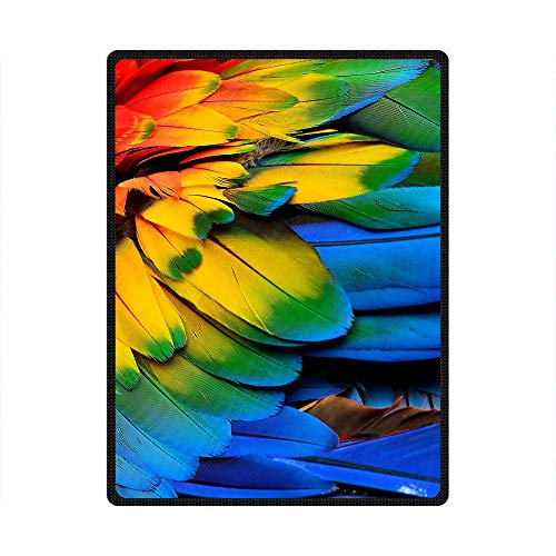 Couverture motif plumes de perroquet pour une pause déjeuner douce au cabinet