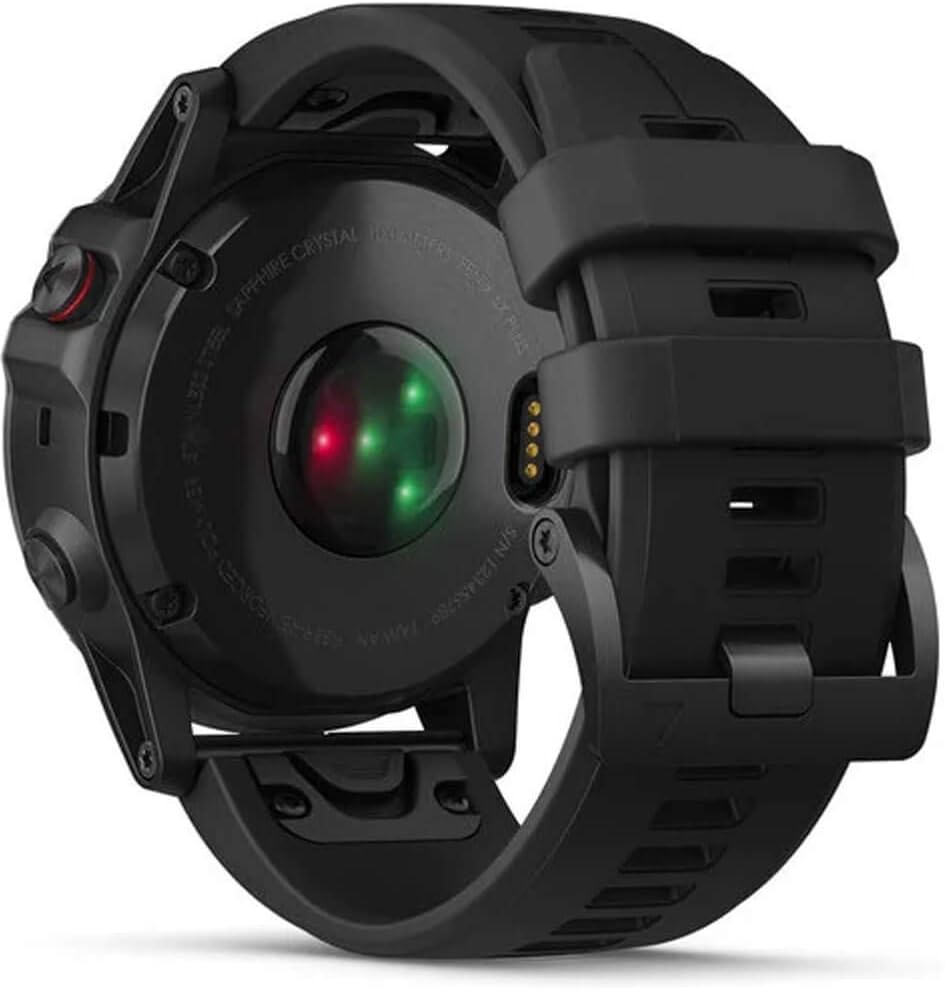 Back of Garmin fenix 5X Plus showing heart rate sensor and charging pins