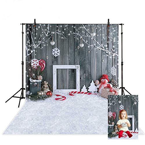 Decorazione di studio fotografico di Natale sfondo finto legno con fiocco di neve e campane di