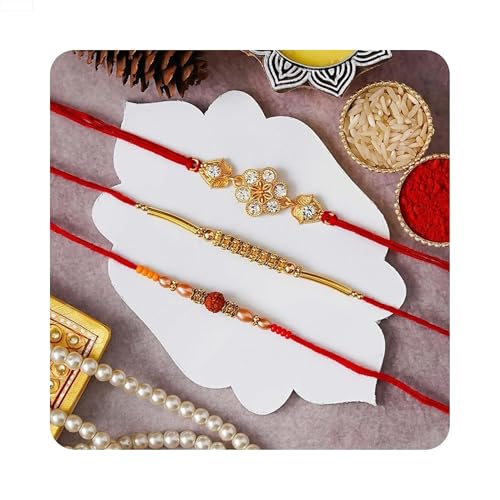 Image of eCraftIndia Red & Golden Set of 3 Trishul with Damru, Lord Ganesha, & Lord Krishna Playing Flute Religious Rakhis with Roli Chawal Pack