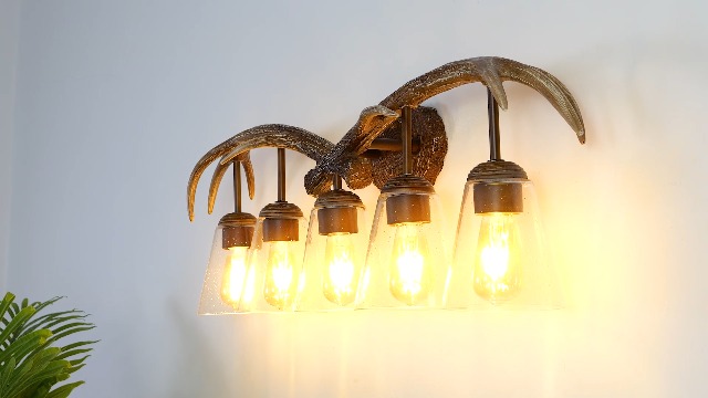 Image of JONATHAN Y 37.75 inch Brown Wood Finish 5-Light Resin Antlers Vanity Light Wall Sconce Rustic Farmhouse for Living Room Bathroom with Clear Seeded Glass Shades LED Bulbs Included JYL6316A