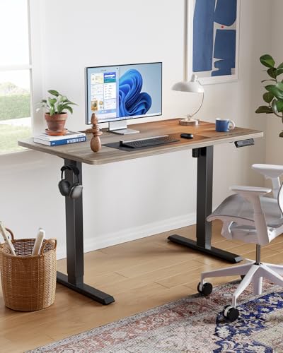HUANUO 55" x 28" Electric Standing Desk Adjustable Height, 4 Memory Height Settings, Headphone Hook, Cable Manager, Sit Stand Up Desk for Home Office & Computer Workstation, Wooden Block