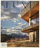 Luxe Interiors +Design Magazine July August 2026 Modern Architecture Against A Mountain Backdrop