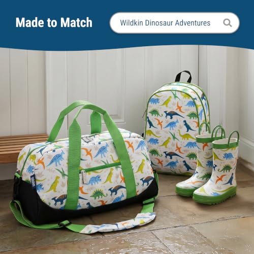 Image of Wildkin Overnighter Duffel Bag for Kids, Dinosaur Adventures | 18 x 9 x 9 in travel duffel with roomy main compartment, exterior zip pocket and removable padded shoulder strap.