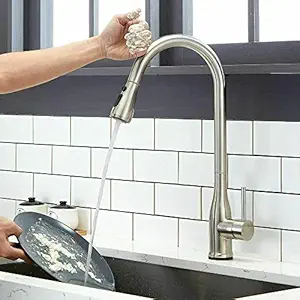 Touch-on sink tap with pull-out tap induction activation