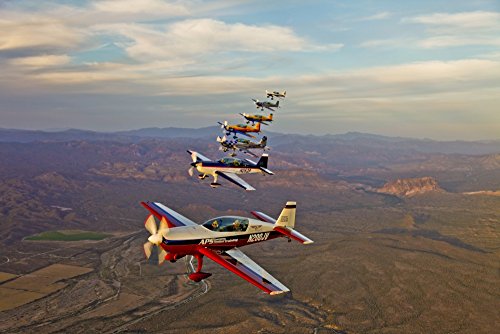 Posterazzi PSTSGR100110M Extra 300 aerobatic aircraft fly in formation during APS training in Mesa...