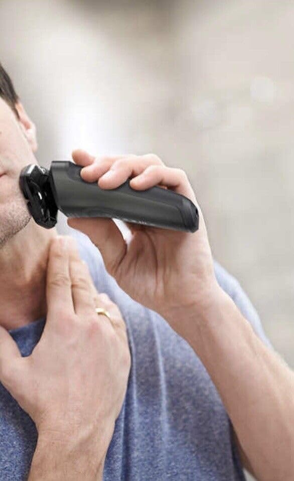 Man using Philips Norelco Shaver 6800 for dry shave