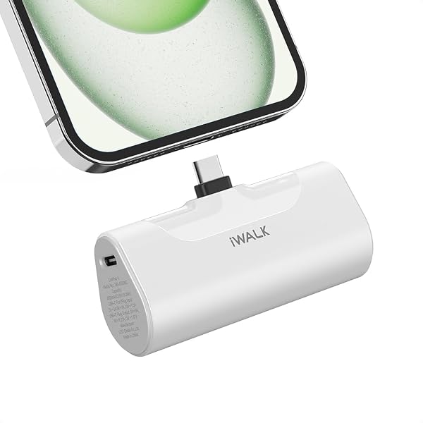 The iWALK portable charger, shown here plugged directly into an iPhone, highlights its compact, cable-free design.