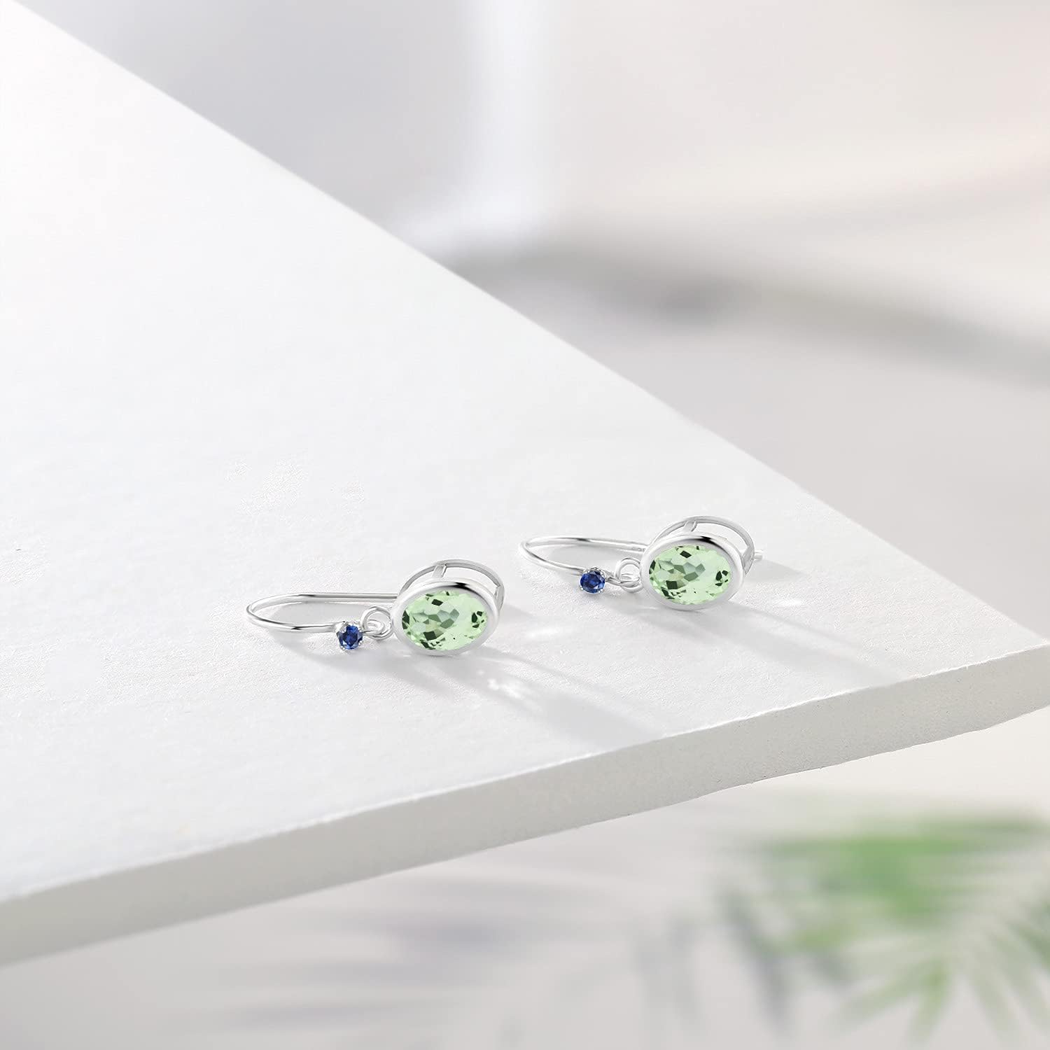 Gem Stone King 925 Sterling Silver Green Prasiolite and Blue Created Sapphire French Wire Earrings For Women (2.02 Cttw, Gemstone, Oval 7X5MM, Round 1.25MM)