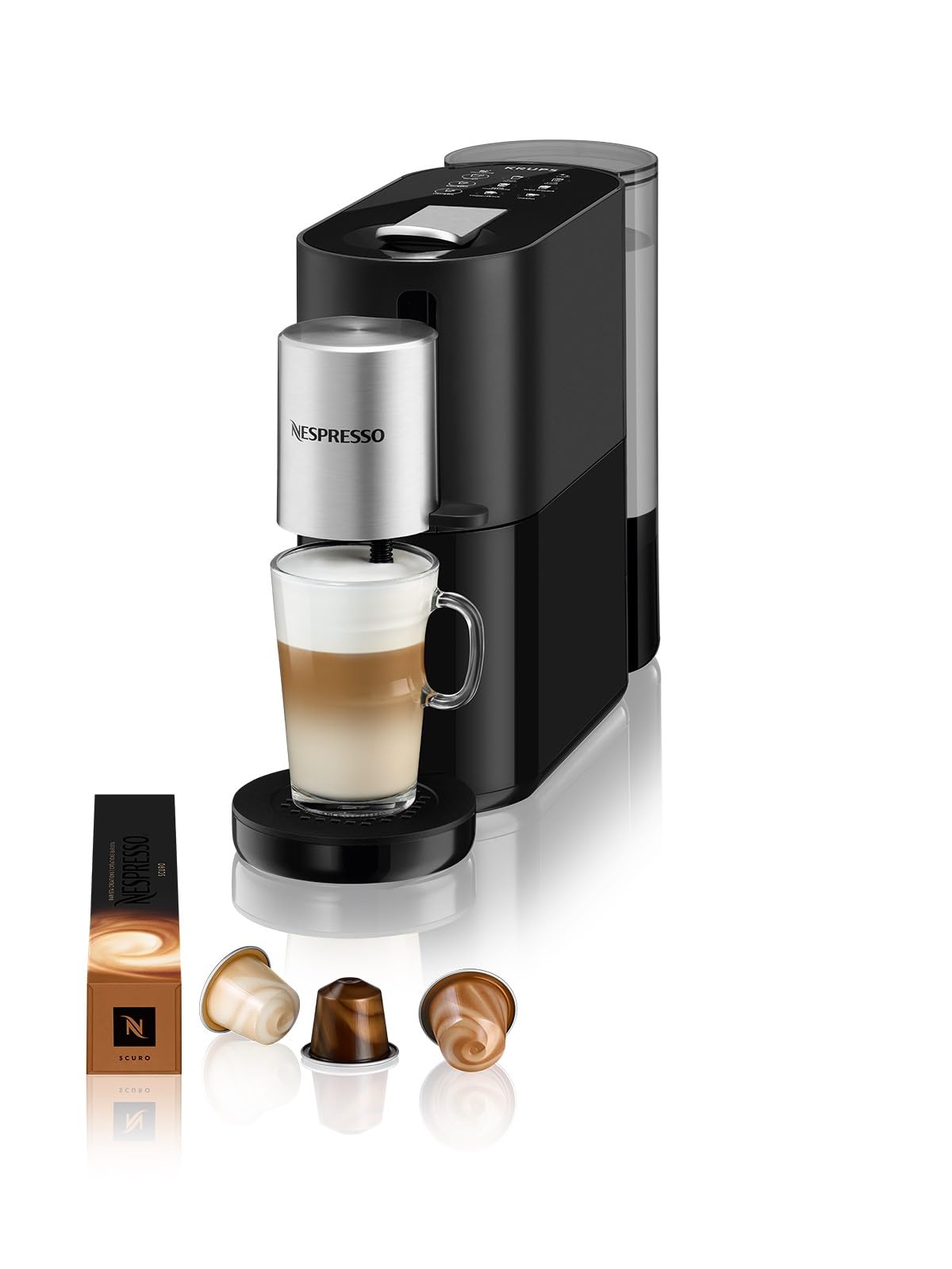 Nespresso Atelier S85 coffee machine with a latte in a glass cup
