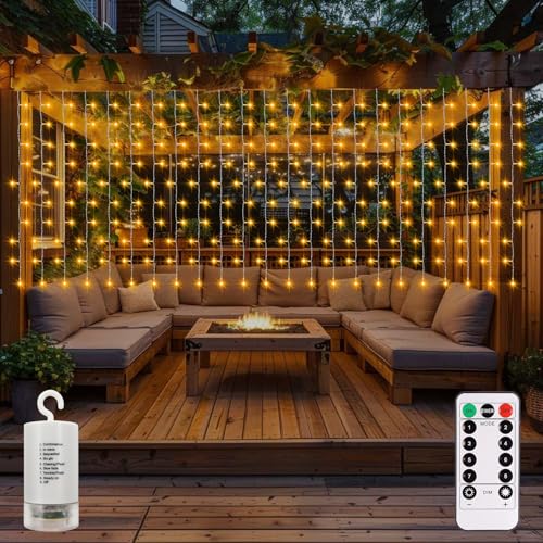CCILAND Cortina de luces LED que funcionan con pilas, 6 m x 1 m, 300 luces LED para exteriores, impermeables, con control remoto, 8 modos, temporizador, regulable, para jardín, valla, cenador