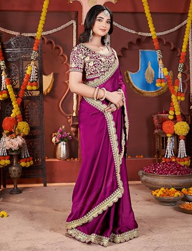 Image of DHARMEE Women's Elegant Designer Sarees Premium Rangoli Fabric with Embellished Border, Lightweight and Stylish Ethnic Wear - Perfect for Parties, Weddings, and Festive Occasions..