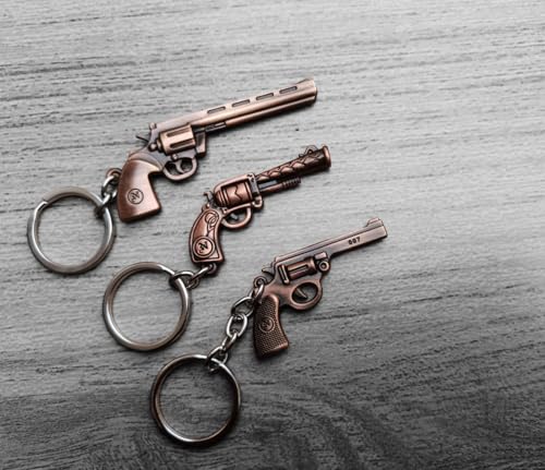 Image of Combo Of Gun Shape Antique Metal Keychain for Cars and Bikes (Pack Of 3) (Bronze)