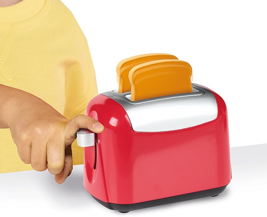 Close-up of the toy toaster with two slices of imitation toast.