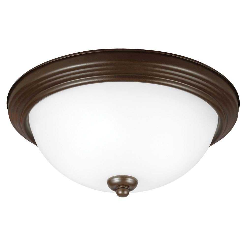 Sea Gull Lighting 7716591S-827 LED Ceiling Flush Mount installed on a ceiling, showing its bronze finish and bell shape.