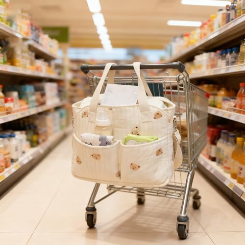 Panier à langer velours marron pour organiser les couches sur la commode de bébé