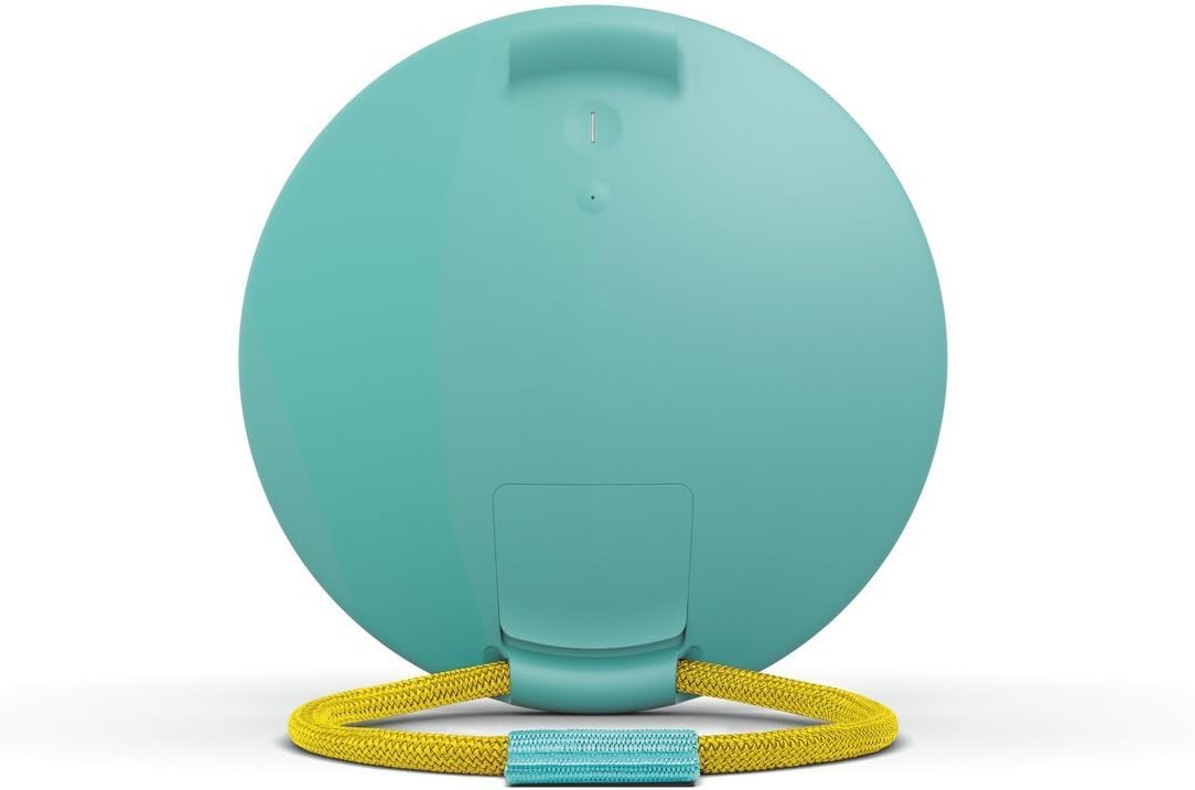 Back view of Ultimate Ears ROLL speaker with waterproof flap open, showing charging port