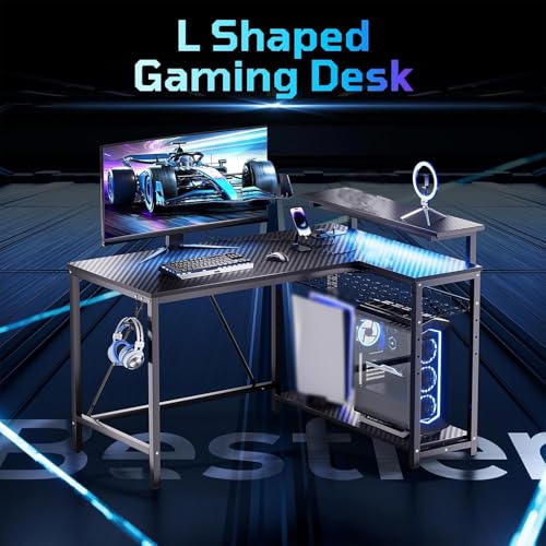 Bestier Gaming Desk with Power Outlets, 42" L-Shaped Computer Desk with LED Lights, Desk with Reversible Storage Shelves & Hooks for Small Spaces, Bedrooms & Offices, Black Carbon Fiber