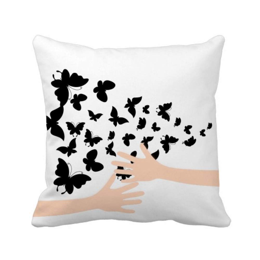 Coussin de papillons sombres aux finitions soignées et tissu doux