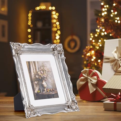 Image of Saysmile 8x10 Vintage Picture Frame with Embossed Flower Design, Silver Ornate Frame for 8x10 or 5x7 Pictures with White Mat, Hand-Crafted Resin Antique Frames for Tabletop & Wall Hanging, Home Decor (Silver)