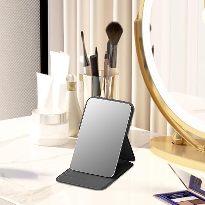 Image of Portable Folding Travel Mirror - Slim PU Leather Makeup Mirror with Adjustable Stand - Lightweight Pocket-Size Vanity Mirror for Purse, Desk, or Travel Use (7 x 10.5 cm) (Black)
