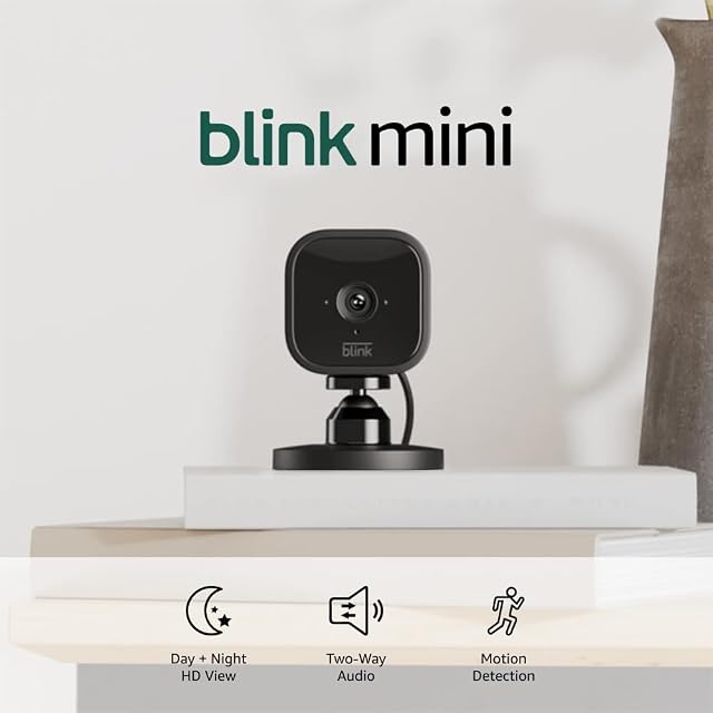 Blink Mini - Compact indoor plug-in smart security camera 1080p HD video night vision motion detection two-way audio