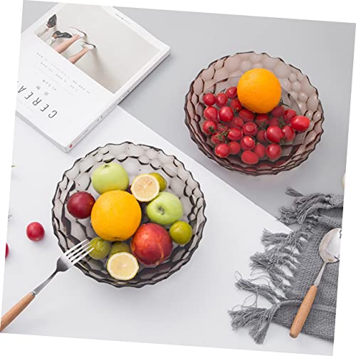 Boîte à goûter aspect cristal contre les tables désordonnées