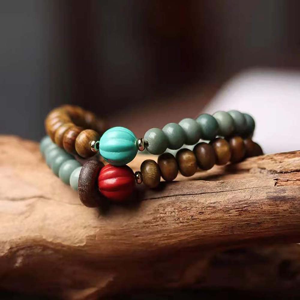 Bellissimo braccialetto Buddha con doppia perla in legno di sandalo