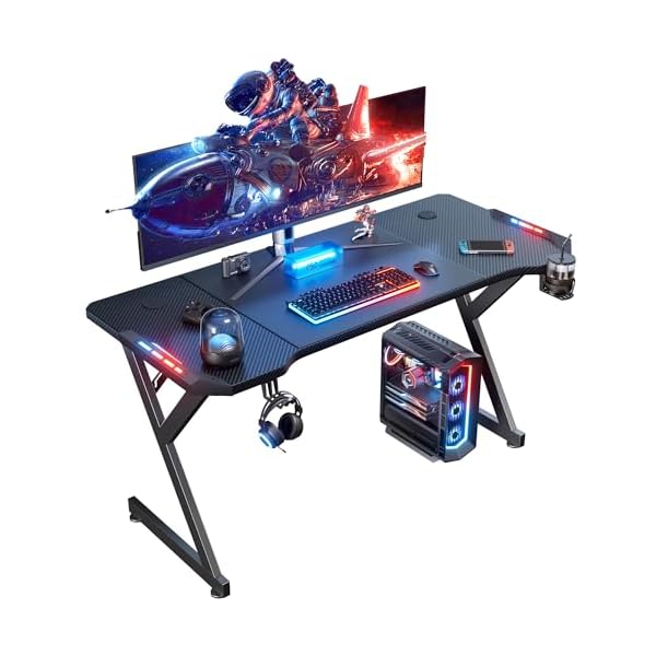 HLDIRECT 47 Inch Gaming Desk with LED Lights, Ergonomic Computer Table with Carbon Fibre Surface, Sturdy PC Workstation Desk for Home Office with Headphone Hook, Cup Holder, Black