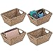 mDesign Juego de 4 cestas trenzadas con asas – Prácticas cestas organizadoras de junco marino para artículos del hogar – Organizador de estantes para salón, dormitorio, baño o pasillo – marrón claro
