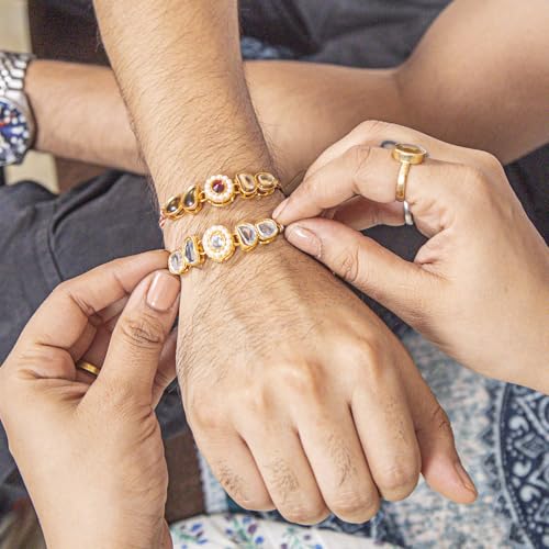 Image of Kaameri Bazaar Kundan Polki Rakhi Set of 5 with Chocolate Coated Almonds 35g, Trail Mix 35g, Chocolate Filled Cookies 75g, Roli Chawal & Greeting Card | Raksha Bandhan Gift Hamper for Brothers