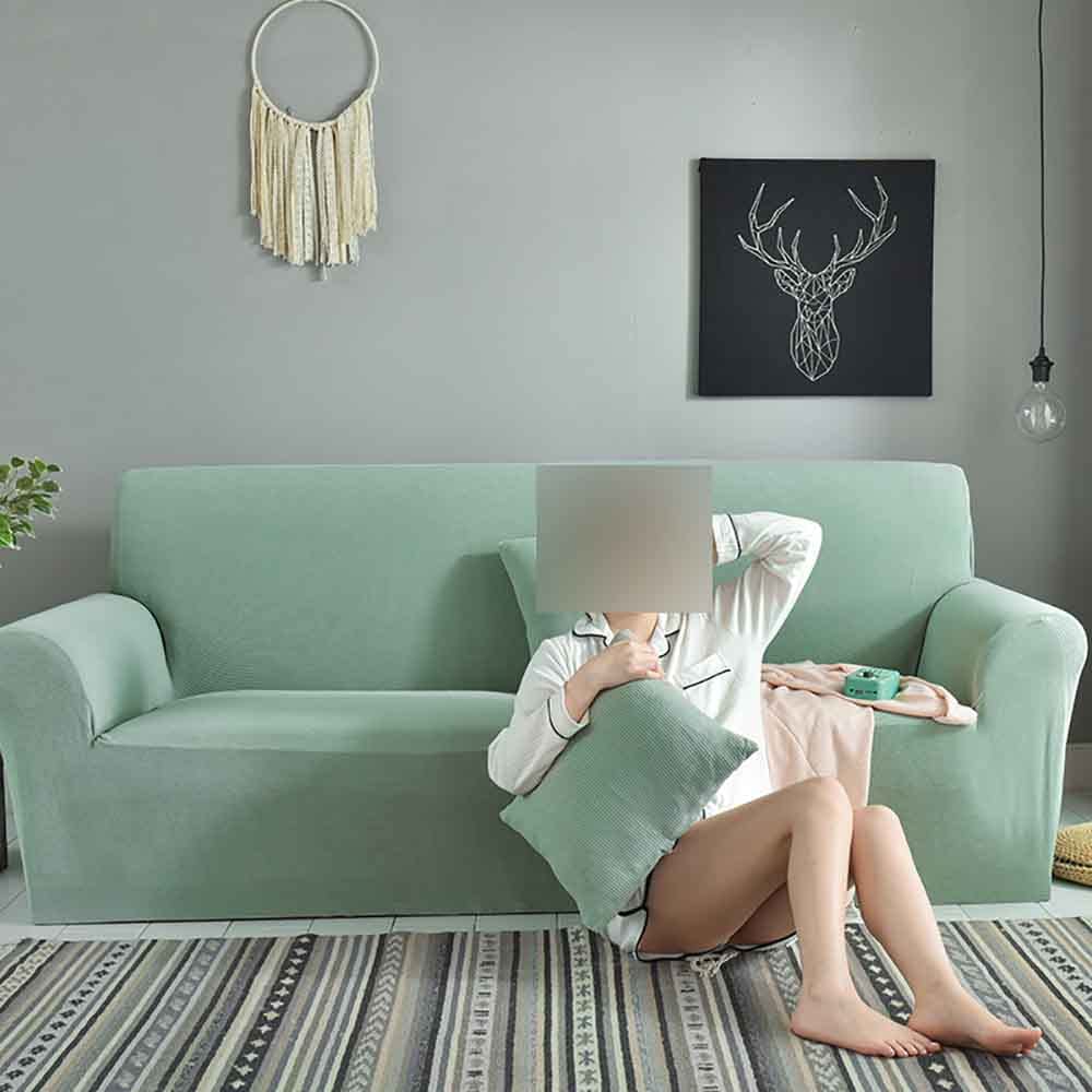 Housse de canapé extensible vert clair pour salon avec enfants