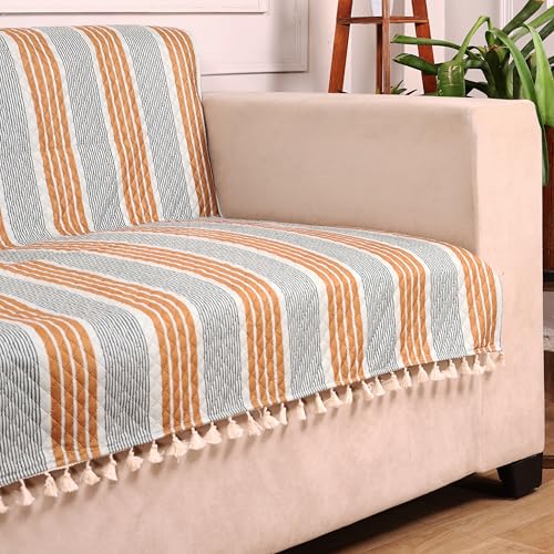 Image of STITCHNEST Quilted Velvet Sofa Cover with Tassels - 48x60 Inch, Mustard & Grey Striped Design, Soft & Stylish, Washable Sofa Protector for 2-Seater