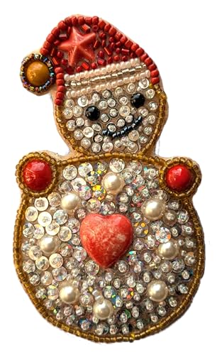 Broche bonhomme de neige en porcelaine d'art faite main avec son chapeau rouge