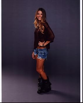 Posterazzi Orly Shani In Cut Off Shorts And Brown Top With Hand On Hip Photo Print 8 x 10 - Item # MVM54991