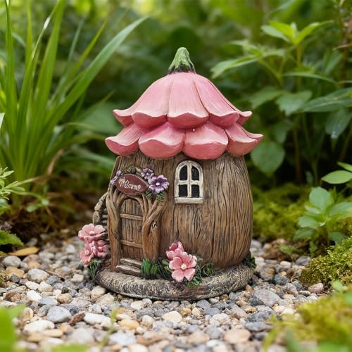 Micro-aménagements paysagers sublimés par une statue en forme de maison détaillée - 5