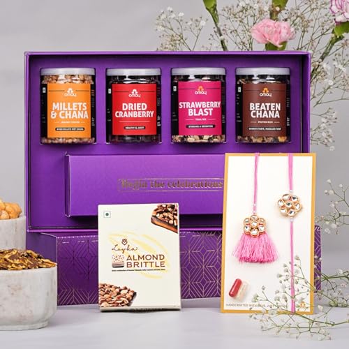 Image of Omay Foods Delicious Delicacies Rakhi Gift Hamper for Bhaiya Bhabhi | 8 Pcs | Roasted Snacks, Dry Fruits, Chocolate & Premium Kundan Couple Rakhi with Lumba | Rakhi Gift for Brother and Bhabhi