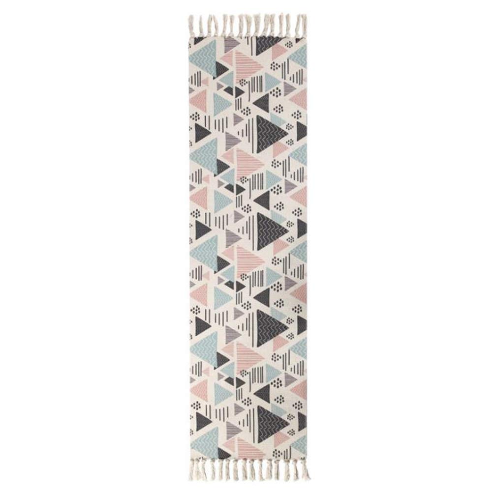 Tapis vintage en coton tissé main premium avec finitions pompons élégantes