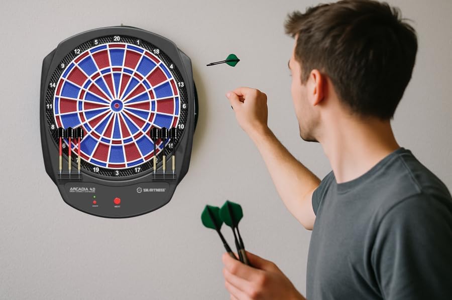 Person throwing a dart at the Carromco Smartness Arcadia 4.0 dartboard