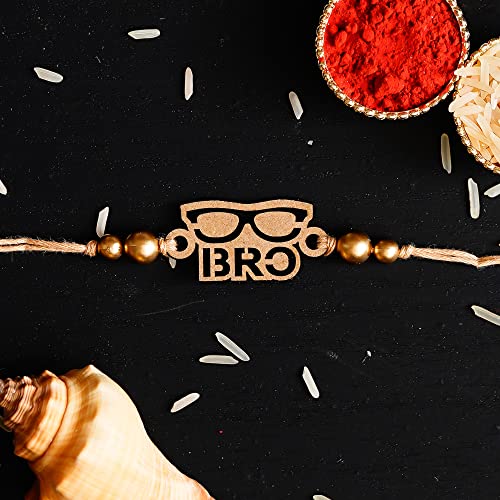 Image of eCraftIndia Golden Designer Bro Kids Rakhi with Roli Chawal Pack | Raksha Bandhan Rakhi