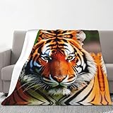 Morbidezza superiore del comfort: realizzata in poliestere, questa coperta in flanella con stampa a righe tigre arancione è ultra morbida e incredibilmente accogliente. La sua consistenza vellutata fornisce un tocco delicato che si sente paradisiaco sulla pelle.