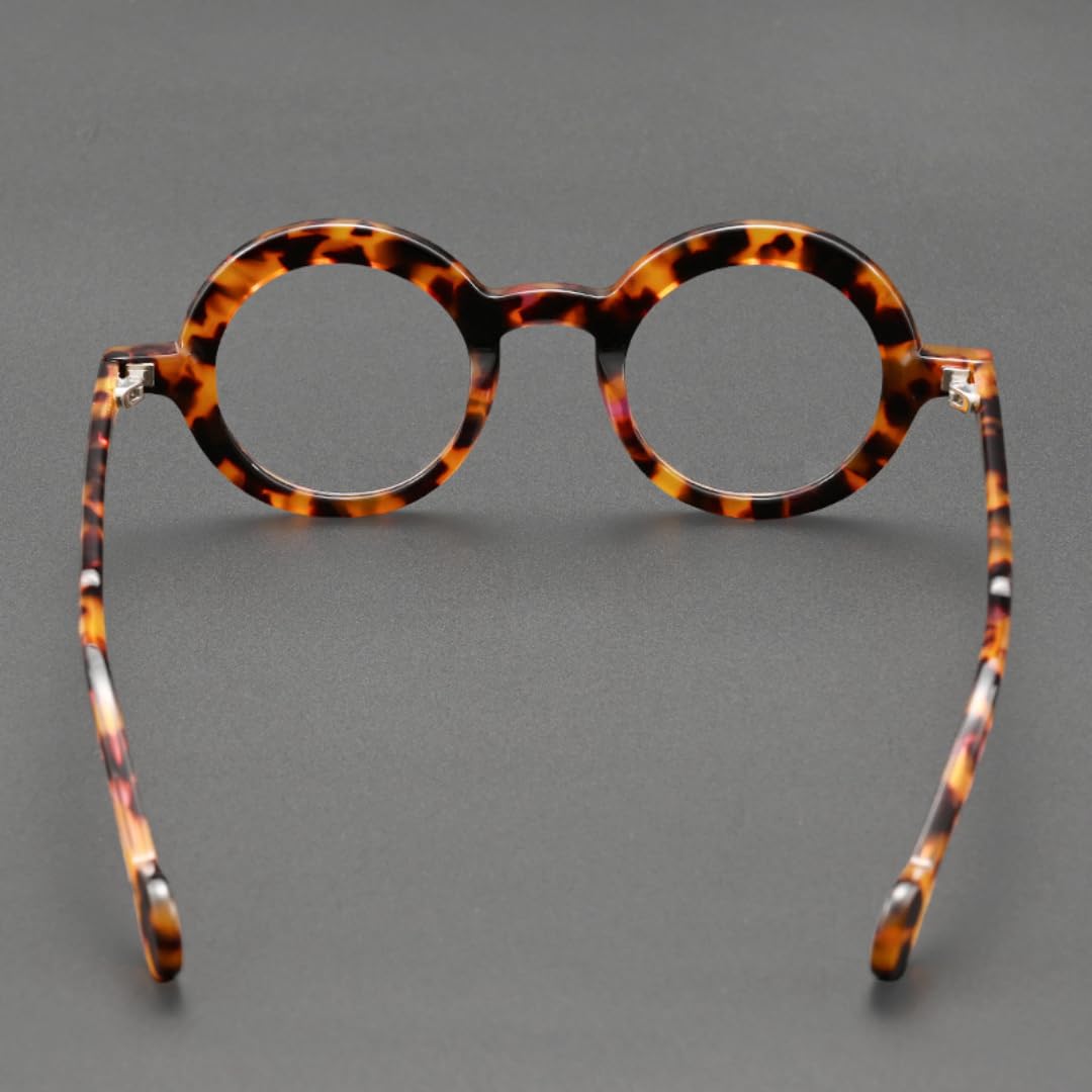 Occhiali da sole rotondi in acetato, montatura alla moda vintage.