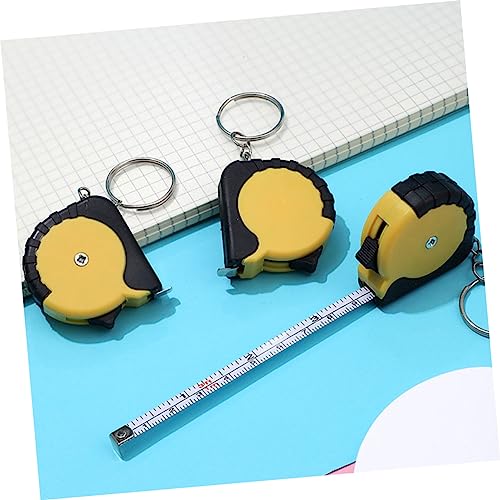 Mini cinta métrica retráctil en llavero 10 piezas miniatura 7